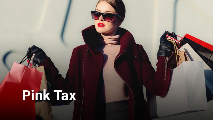 Woman with a pink turtleneck shirt, red overcoat, and multiple shopping paper bags.